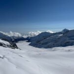 A view from Jungfraujoch, the Top of Europe, looking out over the Aletsch Glacier stretching through the Swiss Alps.