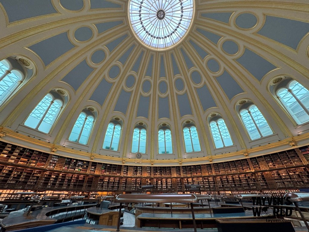 Historic Library Reading Room Circular library reading room with a domed ceiling, tall windows, and rows of bookshelves.