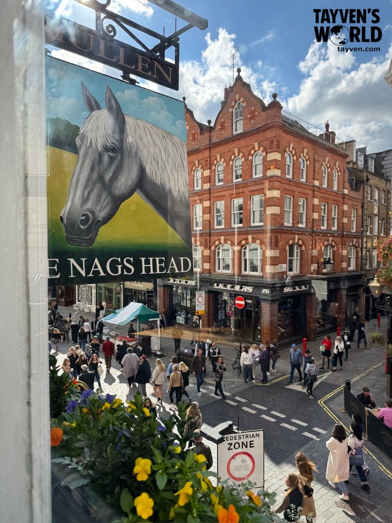 View from The Nag’s Head pub overlooking a busy pedestrian street in Covent Garden.