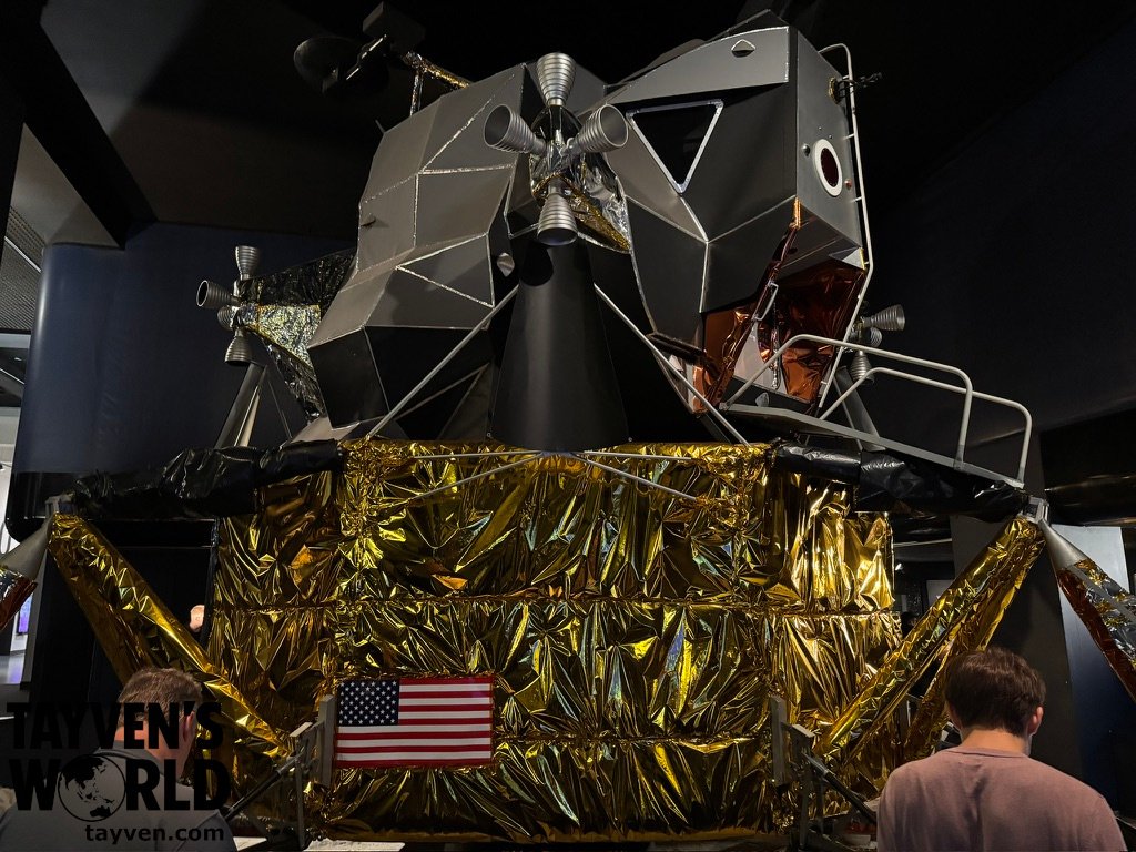 Replica of the Apollo Lunar Module covered in gold foil at the Science Museum in London.