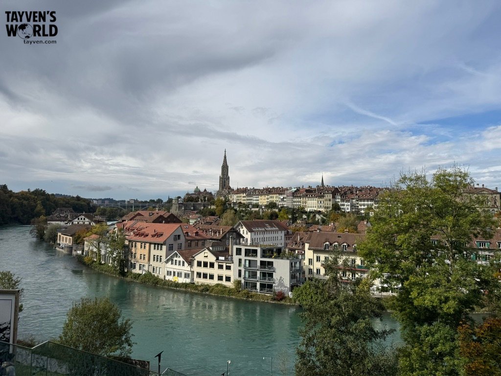 Panoramic view of Bern’s old town and river under a partly cloudy sky