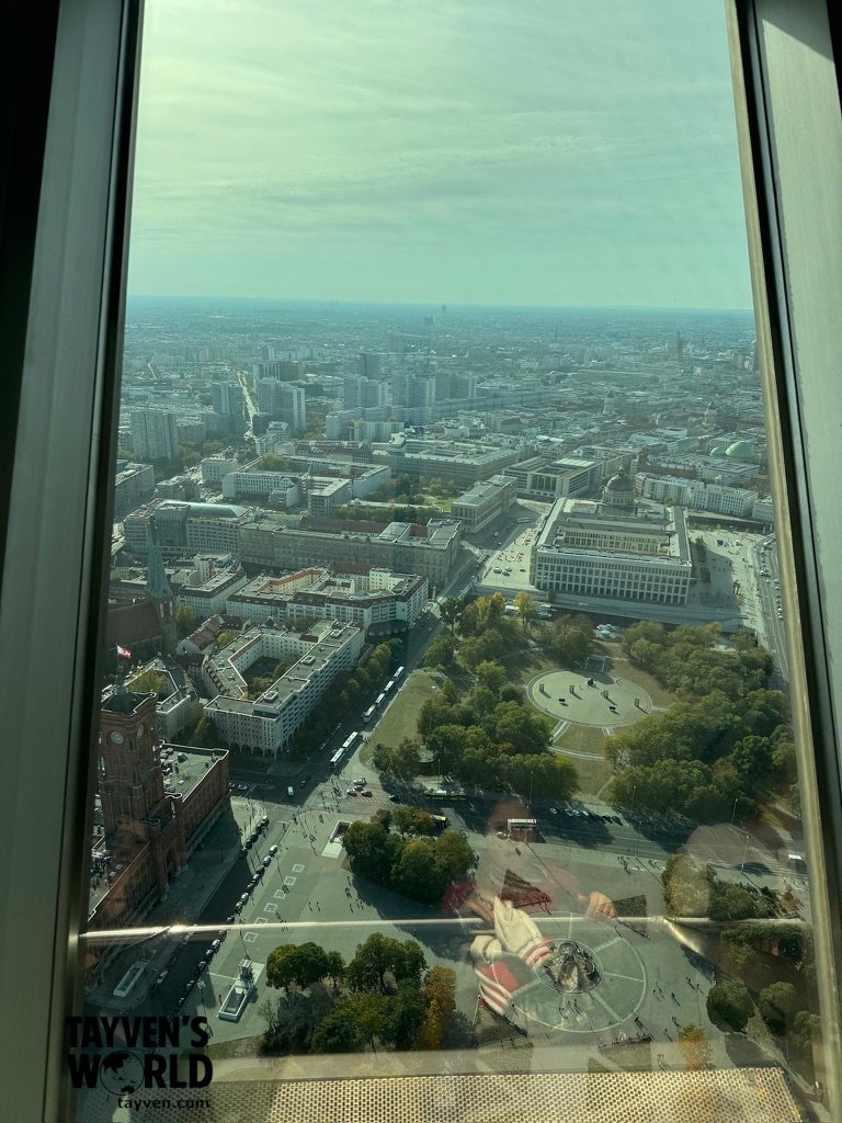 Berlin streets, buildings and parkland viewed through a TV Tower observation window